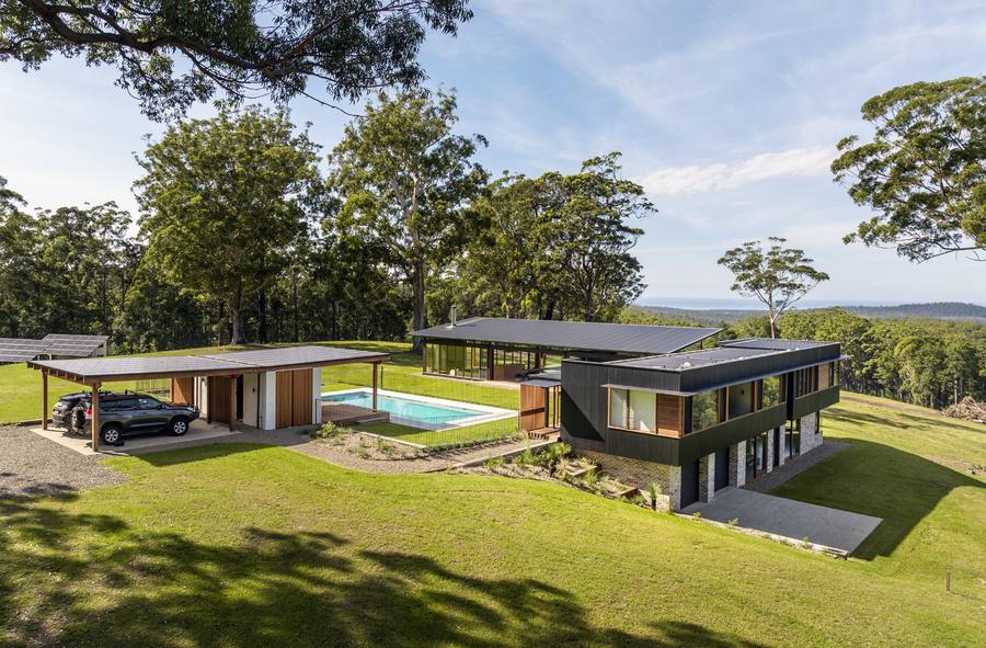 The house, pool and cabana from the air