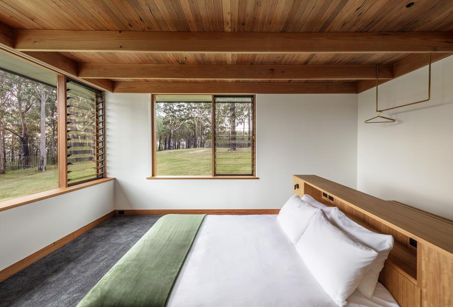 Guest bedroom with timber bedhead