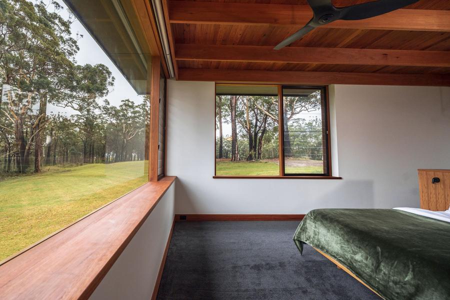 Guest bedroom with a window seat
