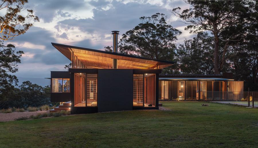 The house at dusk from the lawn
