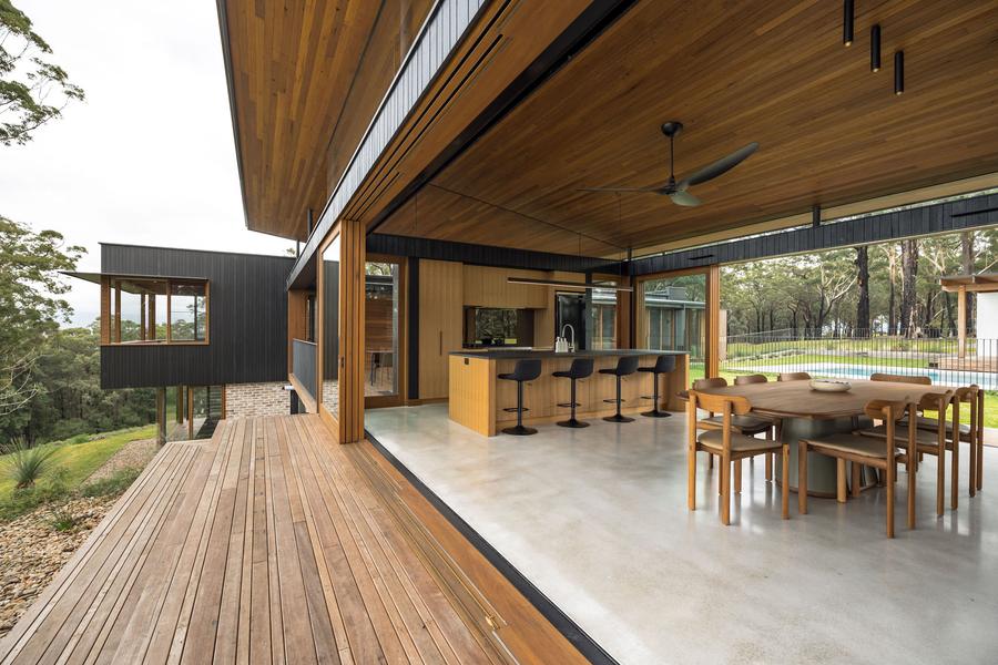 The deck running into the dining and kitchen pavilion