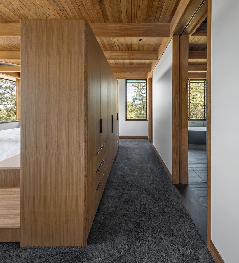 Walk-in robe in timber joinery